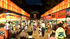 an animated image of people walking down a crowded street at night with lanterns on the buildings