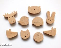 wooden animals are arranged in a circle