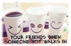 three coffee cups with faces drawn on them sitting on a table next to a plate