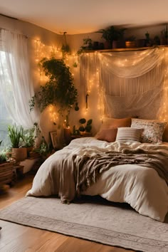 a bedroom with lights strung from the ceiling and plants on the wall above the bed