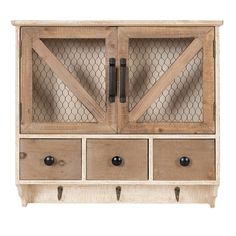 an old wooden cabinet with chicken wire on the doors and drawers, isolated against a white background