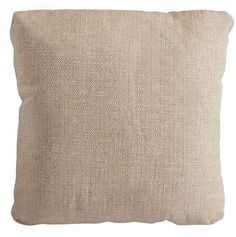 a beige pillow on a white background