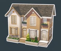 an image of a three story house with flowers in the window boxes