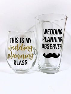 two wine glasses with the words wedding planning and glass written in gold on each one