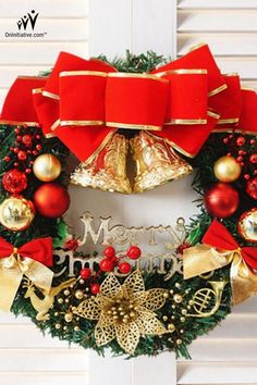 a christmas wreath with red and gold decorations