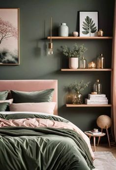 a bed with green sheets and pillows in a bedroom next to shelves filled with potted plants