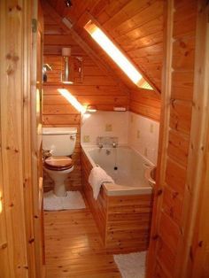 a bathroom with wooden walls and flooring is shown in an instagramtion post