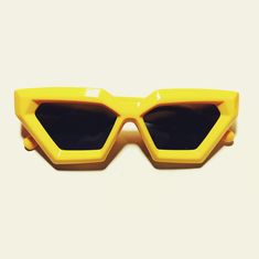 These 1970s vintage style sunglasses feature an oversized Cat-eye lens, are outlined with a chic Black rim, provide UV 400 protection. Dimensions: Length: 6 inches Lens diameter: 3x2.5 inches Cheap Vintage Yellow Sunglasses, Retro Plastic Cat Eye Sunglasses For Party, Retro Cat Eye Sunglasses For The Beach, Retro Yellow Sunglasses With Gradient Lenses, Yellow Plastic Sunglasses For Party, Yellow Plastic Party Sunglasses, Retro Sunglasses With Gradient Lenses, Retro Cat Eye Sunglasses With Mirrored Lenses For Party, Retro Plastic Cat Eye Sunglasses With Uv Protection