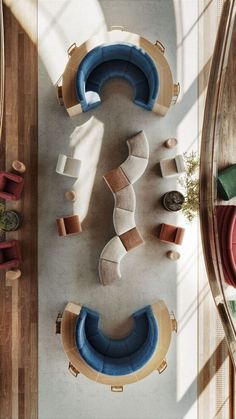 an overhead view of a living room with couches and chairs on the floor next to each other