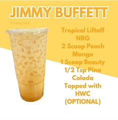 a plastic cup filled with liquid and topped with toppings for jimmy buffet tropical lift