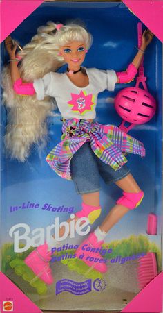 the barbie doll is in its pink box