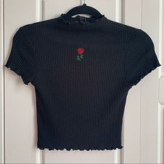 Nwt, Ribbed, Lettuce Hem. Has A Rose Embroidered On The Front. High Ish Neck. Cropped Fitted Floral Embroidery Crew Neck Top, Black Embroidered Stretch Tops, Lettuce Hem Top, Red Lettuce, Lettuce Hem, Ribbed Crop Top, Hem Top, Black Rib, A Rose