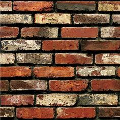 an old brick wall is shown in red and brown tones, with white patches on the bricks