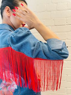 Handcrafted Denim puffed shoulder Jacket, red fringed with handprinted design.  Very unique design Size 12  Machine wash cold, with like colors Do not bleach Only use Warm iron inside the jacket if needed Do not dry clean Festival Denim Jacket With Fringe And Long Sleeves, Spring Festival Denim Jacket With Fringe, Fringe Denim Jacket, Shoulder Jacket, Red Fringe, Womens Jackets, Dark Red, Unique Design, Denim Jacket