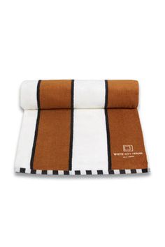 a brown and white towel with black stripes