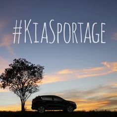 a car parked in front of a tree with the words klasportage written on it