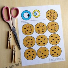 scissors and paper cut out to look like cookies