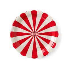 a red and white striped paper plate on a white background