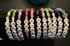 Era's tour & movie bracelets to trade and keep! You can choose the theme of Album Names, Lyrics or Songs. You can also choose between bracelets made with beads & sparkle bits or colorful discs. PSA Once people figured out what the Lyrics bracelets were I had a line of people trading with me and I ran out. I ended up taking orders at the concert. Thank you for checking out my store, appreciate it! Themed Round Beaded Bracelets For Friendship, Beaded Themed Stretch Bracelet For Friendship, Adjustable Beaded Bracelets For Fandom Gifts, White Themed Beaded Bracelet, Customized White Themed Beaded Bracelets, Album Names, People Figures, Beautiful Bracelets, The Concert