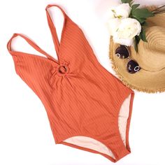 Kona Sol Keyhole Strappy One Piece Swimsuit Size: L Condition: New With Tags Summer Orange V-neck Bodysuit, Orange V-neck Bodysuit For Summer, Chic Red Bodysuit For The Beach, Spring Beach Red Bodysuit, Red One Pieces For Spring Vacation, Bandeau One Piece Swimsuit, Black Bathing Suits, Swimming Bathing Suits, Floral One Piece Swimsuit