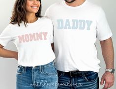 Mommy & Daddy Couple Tee Shirts in white. Perfect tees for a gender reveal, pregnancy announcement, baby shower, or to gift for a new mommy or daddy! Fit: * These shirts are unisex * We recommend measuring a shirt that fits you well and comparing it to the size chart posted. Please see photos for size chart. Features: * Cotton * short sleeves & a crew neck * soft and light stretch Available Colors: *White *Sizes Available: *Small *Medium *Large *XL *2XL *3XL *5XL (Brand on 5XL is Gildan not Bell Gender Reveal Shirts For Parents, Gender Reveal Outfit For Mom, Couple Tee Shirts, Gender Reveal Outfit, Baby Announcement Shirts, Gender Reveal Shirts, Couple Tees, Aunt Shirts, Mommy Shirts