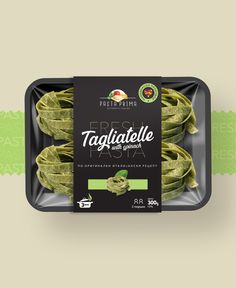 an open package of tagliatelle with spinach