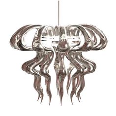 a silver chandelier hanging from the ceiling with long, wavy arms and feet