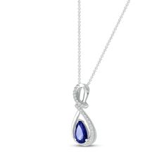 Sparkling and elegant, this beautiful necklace features a pear-shaped blue lab-created sapphire ensconced in swirls of sterling silver. Ribbons of round white lab-created sapphires add alluring shimmer to the sophisticated design. The pendant sways from an 18-inch cable chain that secures with a lobster clasp. Elegant Sapphire Teardrop Pendant Jewelry, Elegant Teardrop Sapphire Necklaces, Elegant Sapphire Teardrop Necklace, Elegant Teardrop Sapphire Necklace, Elegant Blue Teardrop Necklace, Elegant Pear-shaped Blue Jewelry, Elegant Blue Pear-shaped Jewelry, Sapphire Teardrop Pendant Necklace For Formal Occasions, Sapphire Teardrop Pendant Jewelry