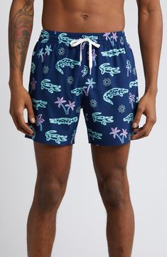 Lightweight and perfectly stretchy, these lined swim trunks move easily in the water and dry quickly on land for comfort no matter where you take them. 5 1/2" inseam; 22" leg opening; 11" front rise; 14 1/2" back rise (size Medium) Lined 92% polyester, 8% spandex Machine wash, tumble dry Imported Casual Relaxed Fit Swim Trunks For Pool, Casual Nylon Swim Trunks For Poolside, Casual Short Swim Trunks For Swimming, Casual Swim Trunks With Upf 50+ For Beach, Casual Swim Trunks Upf 50+ For Pool, Casual Swim Trunks Upf 50+ For Beach, Casual Swim Trunks For Beach Season Water Sports, Casual Short Swim Trunks For Water Sports, Casual Short Swimwear For Water Sports