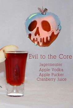 an apple is next to a glass with liquid in it and the words evil to the core above it