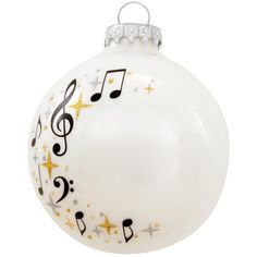 a white ornament with musical notes on it