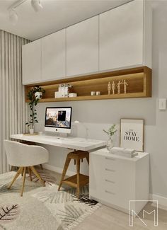 a white desk and chair in a room