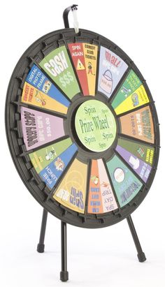 DescriptionRaffle Wheels With Changeable SetupThese raffle wheels are great promotional tools for rewarding participants during a trade show, merchandise sale, fundraiser or office gathering. The spinning carnival displays feature 12 blank sections, giving users freedom to create personalized incentives and awards. These game wheels are also equipped with double the amount of notches, so users can easily switch a 12-slot display to 24 section gaming system! These gaming accessories include a cus Spinning Wheel Game, Board Game Design, Video Production Company, Printable Templates, Summer Activities For Kids, Camping Crafts