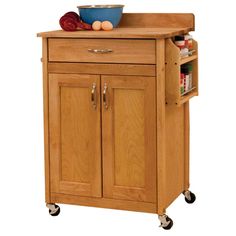 a kitchen cart with a bowl on top of it and some food in the middle