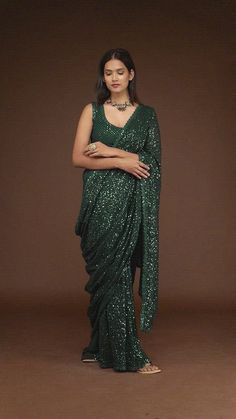 Glamorous Georgette Pre-draped Saree For Celebration, Bollywood Georgette Pre-draped Saree For Party, Green Pre-draped Saree With Dupatta For Party, Festive Sequined Pre-draped Georgette Saree, Celebration Pre-draped Saree With Sequins, Celebration Georgette Blouse Piece With Sequins, Diwali Pre-draped Sequined Saree, Green Pre-draped Saree For Eid Party, Festive Glamorous Georgette Saree