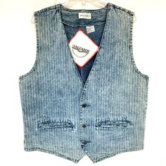 90s/Y2k Deadstock Nwt Acid Wash 3-Button Denim Vest By Unleaded Szl Brand New With Tags! Stunning Suit/ Western Cut Waistcoat Vest With A Subtle Pinstripe Wash. 2 Front Pockets And Adjustable Back Cinch. This Piece Is Ready For The Streets, Rodeo Or Office Casual Day! So Versatile 100% Cotton Flat-Lay Measurements Pit To Pit-22.25” Length Front-26” Length Back-23” For The Streets, Office Casual, Acid Wash, Denim Vest, The Streets, Blue Gray, Rodeo, Flat Lay, Blue Grey