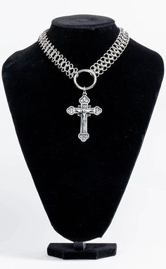 These beautifully detailed cross charms come with a spring gate clasp and can be attached to any of our Anathema keyrings, belt clips, choker necklaces, or bags. You can clip them to anything you like, or wear them on a chain. They look amazing on our chainmail chokers. These charms have a depiction of Jesus on the cross in intricate detail with fresco type engraving. The extra large charm has a red stone on each point of the cross. Cross measurements: Medium: 7cm x 5cm XL: 12cm x 8.7cm O-ring s Handmade Punk Style Cross Jewelry, Punk Style Metal Cross Jewelry, Nickel-free Metal Cross Jewelry, Nickel-free Metal Cross Pendant Necklace, Adjustable Metal Crucifix Chain Jewelry, Metal Crucifix Jewelry With Adjustable Chain, Adjustable Metal Crucifix Jewelry, Silver Metal Cross Necklace Choker, Detailed Cross