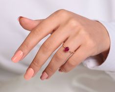 Minimal Dainty Ruby And Diamond Rose Gold-Gold-White Gold 14K Ring Gram: 1.45 gr Diamond: 0.02CT Ruby: 1.32CT Product Code: D127 Ruel Design is an ideal option for women who enjoy the luxury of being well-groomed and stylish with affordable budgets and love to wear quality and specially designed jewelry. We offer an alternative to women who pursue elegance and who will find it difficult to choose from rings to necklaces, earrings to bracelets. Our jewelry is made with real solid gold and natural diamonds and gemstones . All items in our store are handmade products. A few products have been made by Ruel Design. Our fancy jewellery will be unique and special for you and you will shine like a star. Ruel Design the best way to be unique, simple, and stylish. Elegant Gia Certified Gold Ruby Ring, 14k Rose Gold Ruby Ring, Rose Gold Gia Certified Jewelry, Gia Certified Yellow Gold Ruby Wedding Ring, Gia Certified Rose Gold Jewelry, Gia Certified Yellow Gold Ruby Ring With Round Cut, Oval Pink Gold Ruby Ring Fine Jewelry, Oval Pink Gold Ruby Ring, Fine Jewelry Style, Pink Gold 14k Ruby Ring