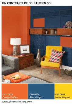 a living room with orange and blue walls