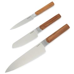 three knives with wooden handles on white background