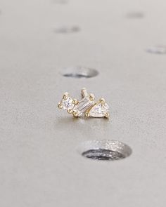 Tiny Cluster Diamond Stud Earrings, 14K Gold, Three Stone Diamond Earrings, Multi Shape Small Pear Baguette Round Diamonds, Anniversary Gift * Images show 14K Yellow Gold option. Elevate your style with our enchanting three-stone solid gold earrings, featuring a delicate cluster of tiny pear, baguette, and round diamonds. Whether you opt for a single earring or a pair, these earrings effortlessly combine classic charm with modern sophistication for an exquisite addition to your jewelry ensemble. Three Stone Earrings, Small Diamond Cluster Earrings, Single Cut Diamond Cluster Earrings, Classic Gold Diamond Cluster Earrings, 14k Gold Cluster Earrings With Diamond Cut, Classic Diamond Cut Cluster Earrings In 14k Gold, Three Stone Diamond, Solid Gold Earrings, Small Earrings Studs