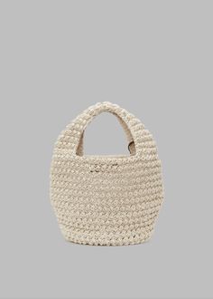 Color: Natural Knitted cotton blend basket bag Leather hanging anchor charm Main compartment with an open top Top handle Leather logo patch in the interior Unlined 80% Cotton 15% Full Grain Calf Leather 5% Polyurethane By JW Anderson. Made in Georgia Popcorn Basket, Anchor Charm, Jw Anderson, Basket Bag, Top Top, Leather Logo, Open Top, Knit Cotton, Popcorn