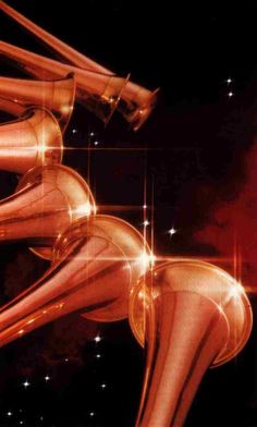 an abstract image of the legs and ankles of a woman with glowing lights in the background