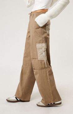 Level up your streetwear style with the PacSun Brown Toggle Baggy Cargo Pants. These on-trend mid-rise pants combine edgy style with comfort, featuring a baggy fit, cargo pockets, and an adjustable toggle waist for a customizable fit. Baggy Wide Leg Bottoms For Streetwear, Trendy Baggy Pants With Multiple Pockets, Trendy Baggy Khaki Wide Leg Pants, Baggy Full-length Utility Parachute Pants, Trendy Wide Leg Khaki Cargo Pants, Oversized High Waist Pants For Streetwear, High Waist Cotton Wide Leg Pants For Streetwear, Trendy Parachute Pants With Cargo Style, Hip Hop High Waist Baggy Parachute Pants