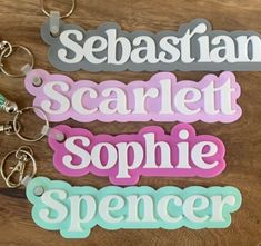 "The sweetest keychain!  Perfect for finding your book bag or sports bag quickly! This 6-8\" long name personalized name features two layers (name + background layer) of 1/8\" acrylic in colors shown. Classic Boho font will add a sweet touch to a school backpack or bag.  The length of the tag will depend on the letters in the name. Approx 1.5-2\" tall. Included with tassel and keychain hook. Colors of tassel will be random and coordinated, though not be the same color as acrylic. If you have a special request for tassel color please add a note when you order :) Font shown is the font used for this listing." Personalized White Keychain For School, Customized Rectangular Keychains For School, Custom Name Pink Keychains For School, Custom Name White Keychains For Everyday Use, Custom Name White Keychain, Customized Multicolor Keychains For School, Customizable Cute School Keychains, Cute Customizable School Keychains, Name Background