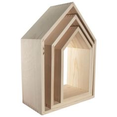 a small wooden house made out of plywood planks and unfinished wood, on a white background