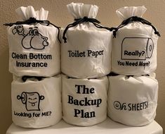 five bags with the words, toilet paper you need more and they are stacked on top of each other