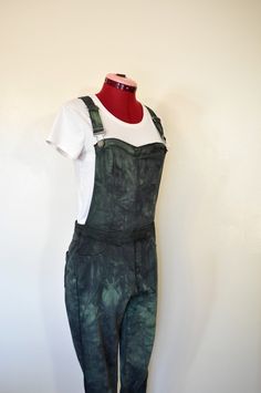 Item# 230262 I have been dying denim regularly - I just started dying other items like these overalls. They have been a big hit! DETAILS: Upcycled Denim Bib Overalls "Almost Famous" Brand 40%Cotton/32%Poly/27%Rayon/1%Spandex Mottled Dyed Black & Green Bib overalls - tapered leg and stretchy fabric Size Juniors Medium Measurements: Womens Size Medium 32" Waistline  38" Hips 28" inseam (length of the legs from crotch to hem) 30" Rise (full length from shoulder to crotch) 20" thigh 10" cuff 81 cm W Green Overalls, Womens Overalls, Overalls Pants, Bib Overalls, Upcycled Denim, Almost Famous, Overalls Women, Denim Overalls, How To Dye Fabric