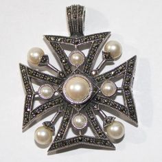 Vintage Sterling Silver Judith Jack Pendant In A Maltese Cross Design Set With Faux Pearl And Encrusted With Marcasite Stone. Bale Is Large Enough To Fit Most Chains Or Cords. Pendant Measures From Top Of Bale Down, 1 And 7/8ths Of An Inch Length And 1.5 Inches Wide. Stamped With Judith Jack Hallmark, Sterling, And Acid Tests Positive For Sterling Silver. O Judith Jack Jewelry, Sterling Silver Marcasite, Maltese Cross, Cross Design, Cross Designs, Accessories Jewelry Necklace, Design Set, Women Accessories Jewelry, Maltese