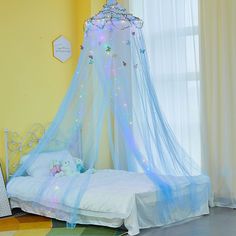 PRICES MAY VARY. Princess Bed Canopy -- Our girls canopy is dotted with glow-in-the-dark stars and LED lights(Battery not included), which illuminates the bedroom. It will looks more dreamy at night. Kids will love to go to bed on time and no longer afraid to turn off the lights when they go to sleep. Get a good night’s sleep. Package Included -- 1pcs bed canopy, 1pcs sticky hook, 1 set screw and hook, butterflies and stars stickers, 10meters LED light(Battery not included), 20meters rattan. DIY Diy Princess Room, Mint Bedroom, Princess Canopy Bed, Princess Canopy, Bed Drapes, Princess Room Decor, Canopy Bed Curtains, Canopy Curtains, Toddler Crib